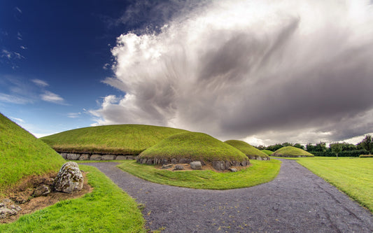 A summer shower (cumulonimbus) approaches the Knowth megalithic complex in the Boyne Valley.