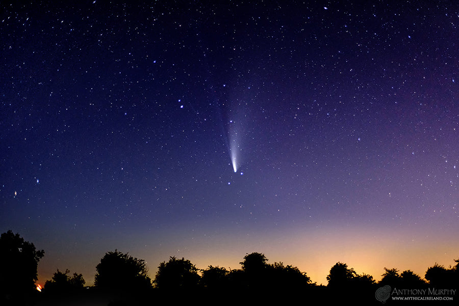 Comet NEOWISE glowing splendidly among the glittering stars of Ursa Major in the far north of the sky. Taken in the early hours of the morning close to Newgrange, in the countryside of County Meath.