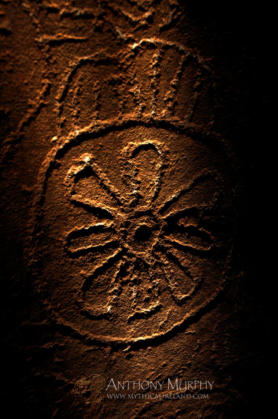 A sunwheel engraving from the 'Equinox Stone' at the rear of the chamber of Cairn T (The Hag's Cairn), Loughcrew. This stone receives the light of the sun at the equinoxes. 