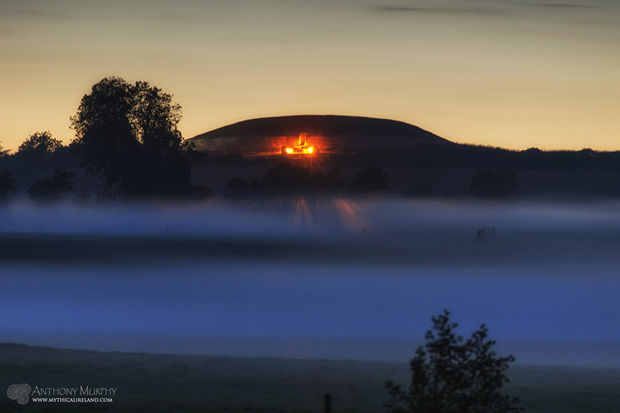 Newgrange above autumn mist
