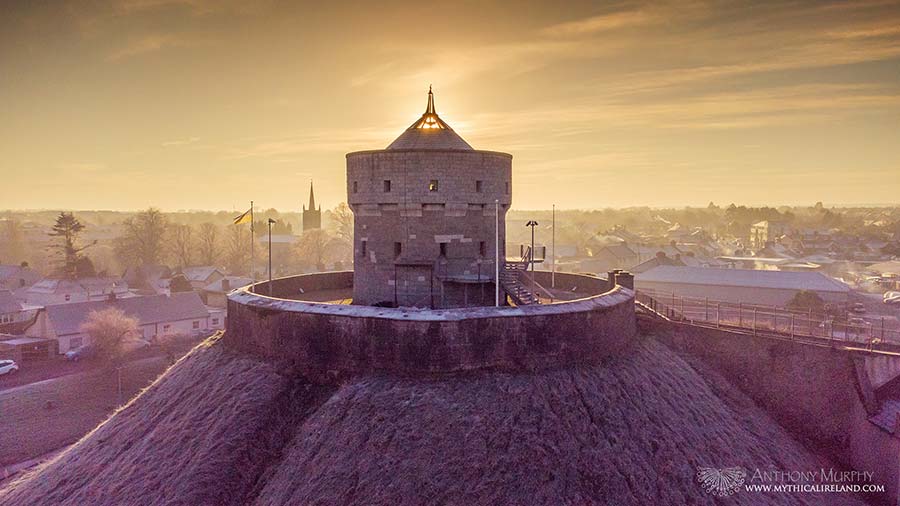 An aerial view of the great mound and martello tower of Millmount, Drogheda, captured at dawn. The temperature was minus 3 Celcius and a significant frost had built up during what was a cold week. The fog had slowly lifted, but there was still a mist in the air. I hope you like this very atmospheric shot of one of Drogheda's great landmarks.