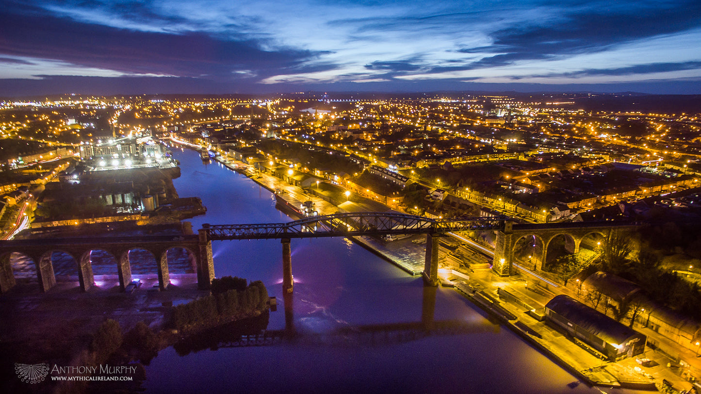 A magnificent view of the Gateway to the Boyne Valley – Drogheda and its great Boyne Viaduct pictured from the air at dusk.
