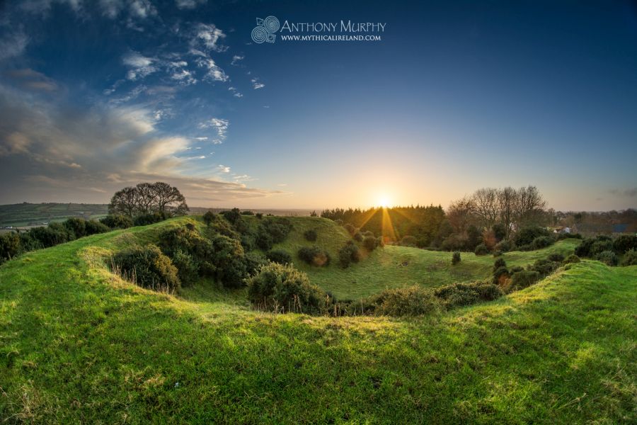 A winter sunset viewed from the top of Dowth, and its great crater.