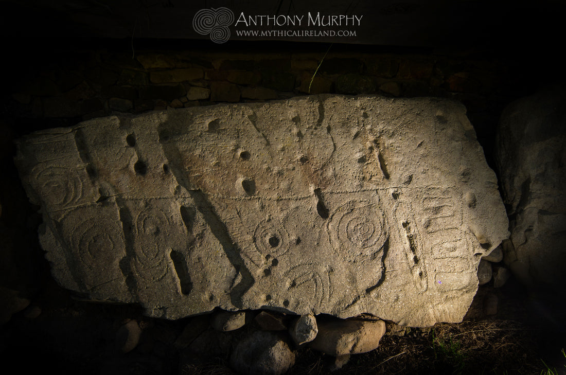 Knowth kerbstone 83 - natural and man-made holes