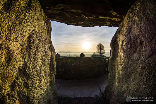 Pondering eternity at the entrance to the great sí­dhe of Newgrange