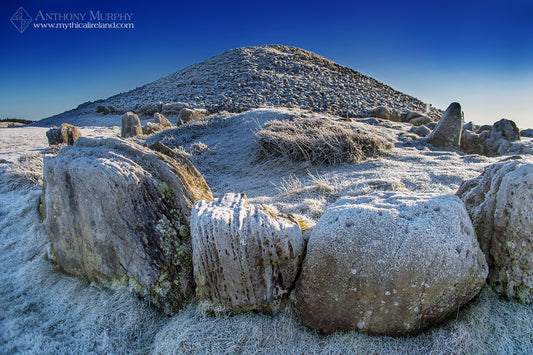 Cairn S (foreground) and Cairn T (The Hag's Cairn) at Slieve na Calliagh, Loughcrew,&nbsp; County Meath, covered in ice after a night of hard winter frost.&nbsp;
