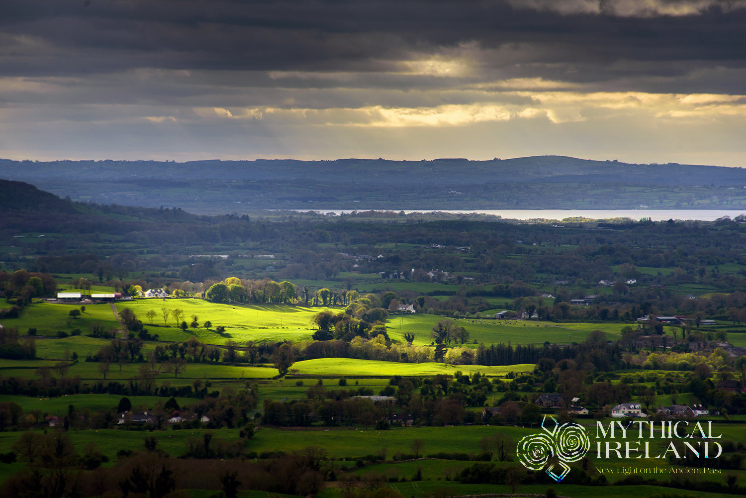 A sun beam bathes the lush Irish countryside