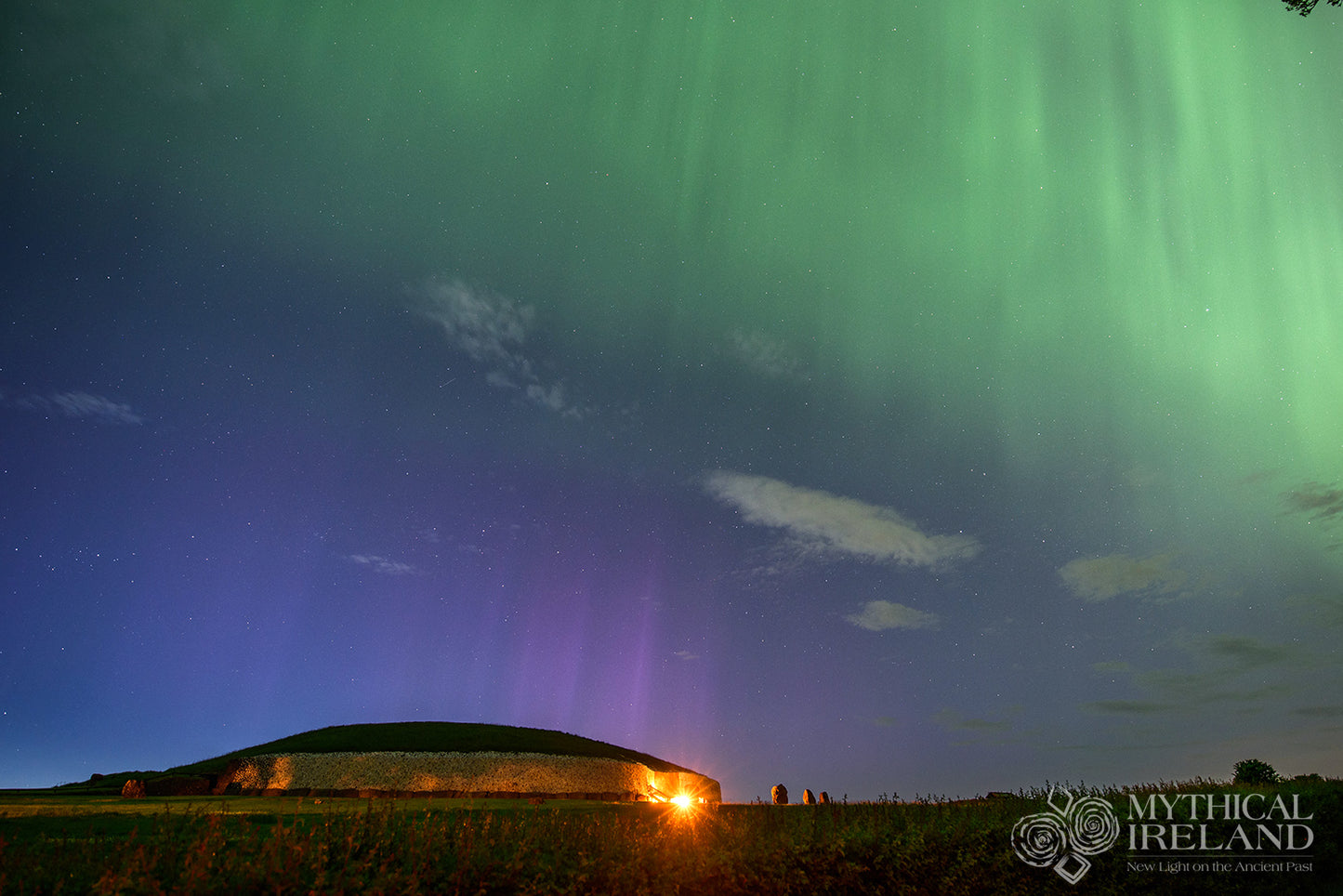 Green and blue aurora borealis over Newgrange