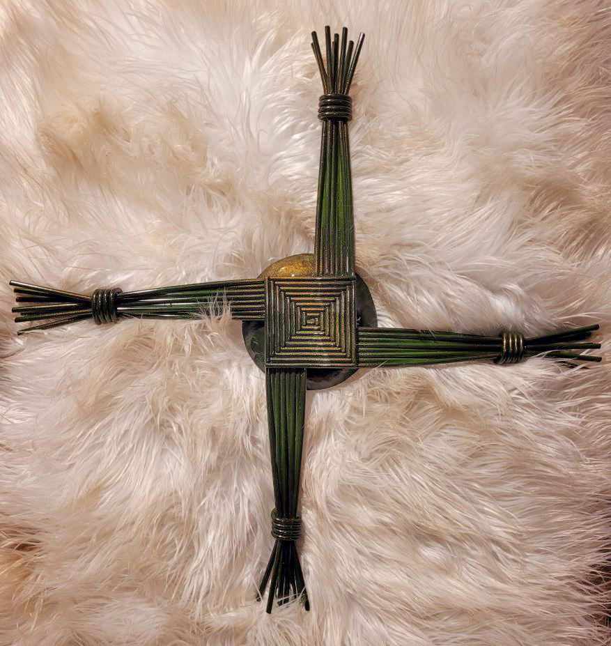 This magnificent hand-forged steel Brigid's Cross is made by traditional blacksmith Tom King 'An Gobha' at his forge in Bohermeen, in the heart of the Boyne Valley, Co. Meath. Size: 420mm x 420mm. Weight: 2kg. PRIZE WINNER: Tom's Brigid's Cross was awarded Best Overall Product Winner at the Showcase Ireland 2023 event at Dublin's RDS. Please allow a couple of weeks for delivery as each item is hand-made to order.
