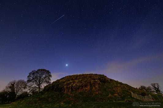 The Evening Star and satellite over Dowth
