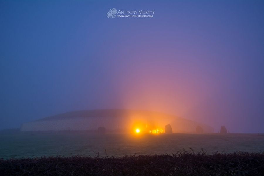 Newgrange emerges from the mist