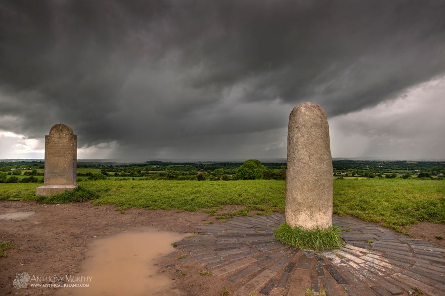 A summer storm cloud approaches the Lia Fáil and the Hill of Tara. Ireland is known for its capricious weather, and some days it changes often. In the summer time, large rain showers can develop, and huge towering cumulonimbus clouds formed by convection can empty considerable downpours upon the landscape. This changing weather makes for some quite dramatic photographs. This is one of my favourites.