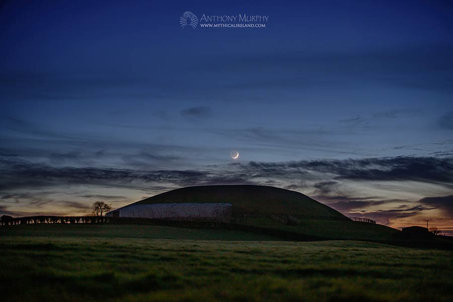 Crescent moon setting over Newgrange