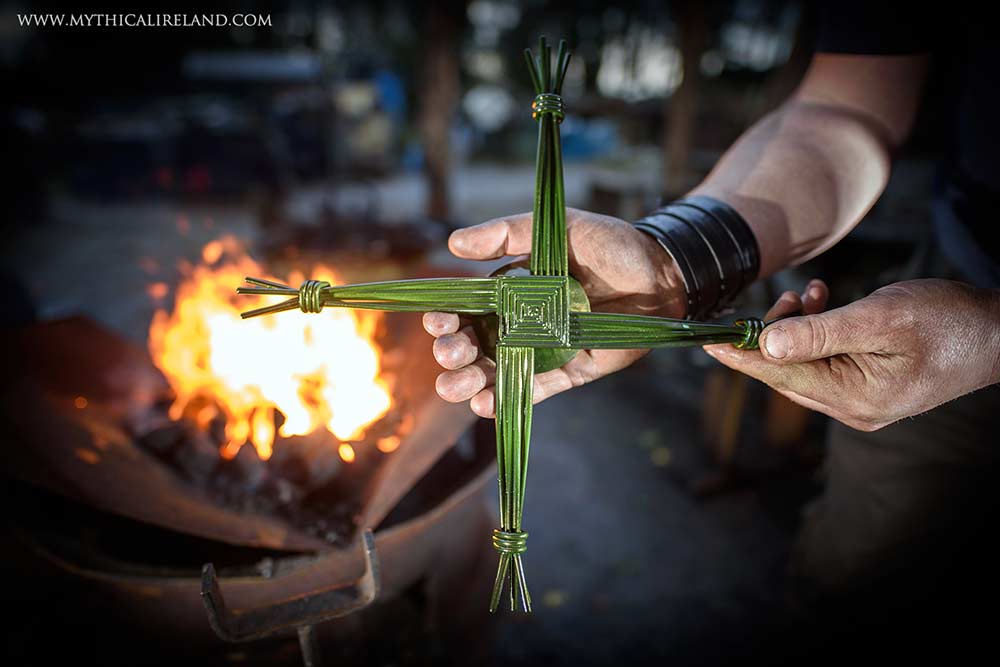 This magnificent small hand-forged steel Brigid's Cross is made by traditional blacksmith Tom King 'An Gobha' at his forge in Bohermeen, in the heart of the Boyne Valley, Co. Meath. Size: 360mm x 360mm. Weight: 1.3kg. PRIZE WINNER: Tom's Brigid's Cross was awarded Best Overall Product Winner at the Showcase Ireland 2023 event at Dublin's RDS. Please allow a couple of weeks for delivery as each item is hand-made to order.