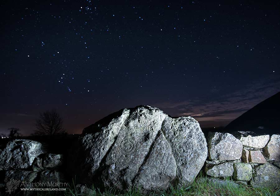 Knowth spiral stone under the stars of Orion
